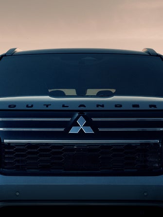 Enhanced front badging on the new 2025 Mitsubishi Outlander SUV