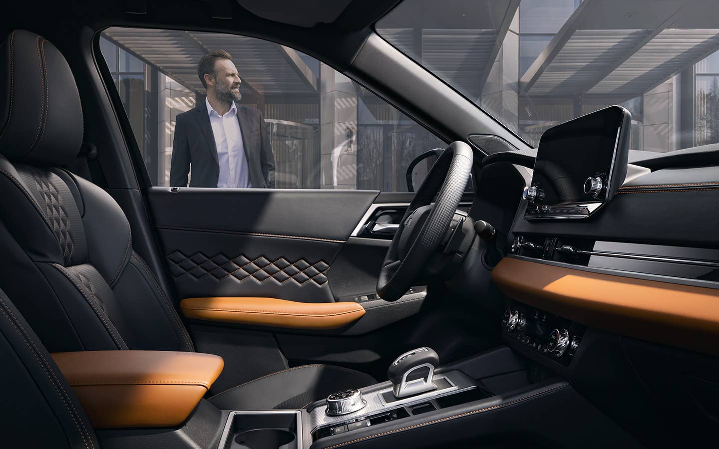 Driver using the My Mitsubishi Connect app to Smart Remote Start a Mitsubishi SUV